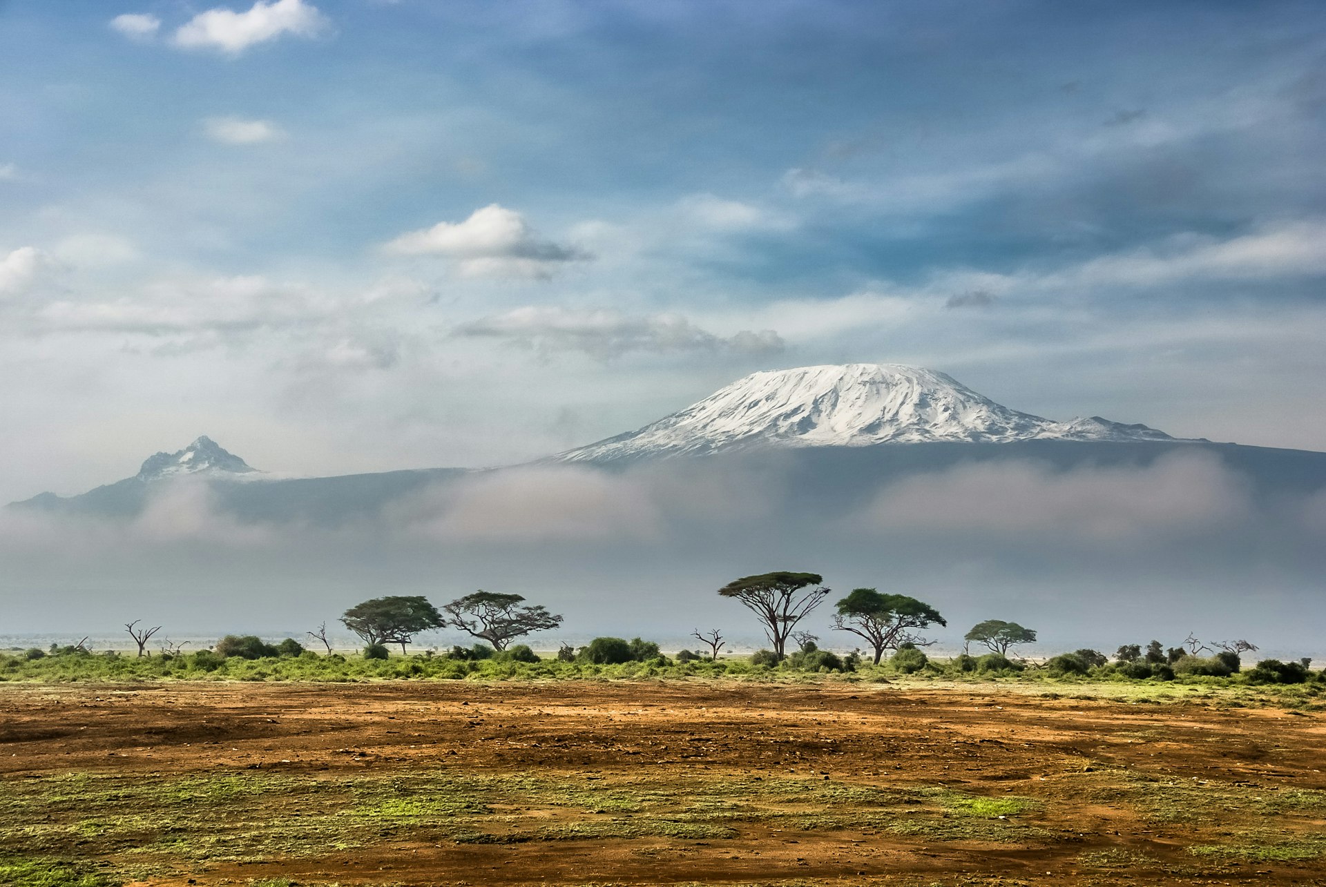 Mount Kilimanjaro rising above acacia plains