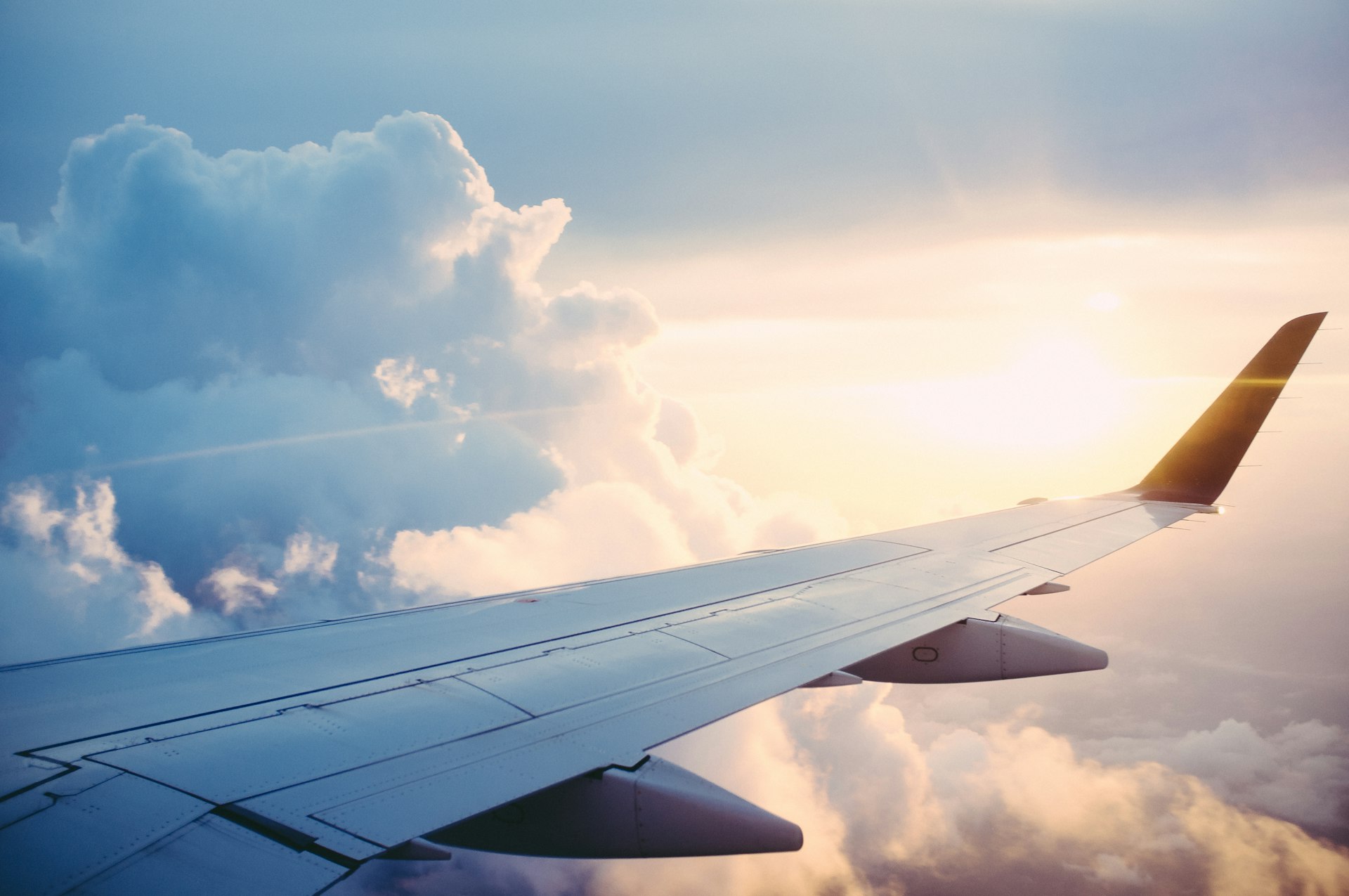 View over an aircraft wing at sunset